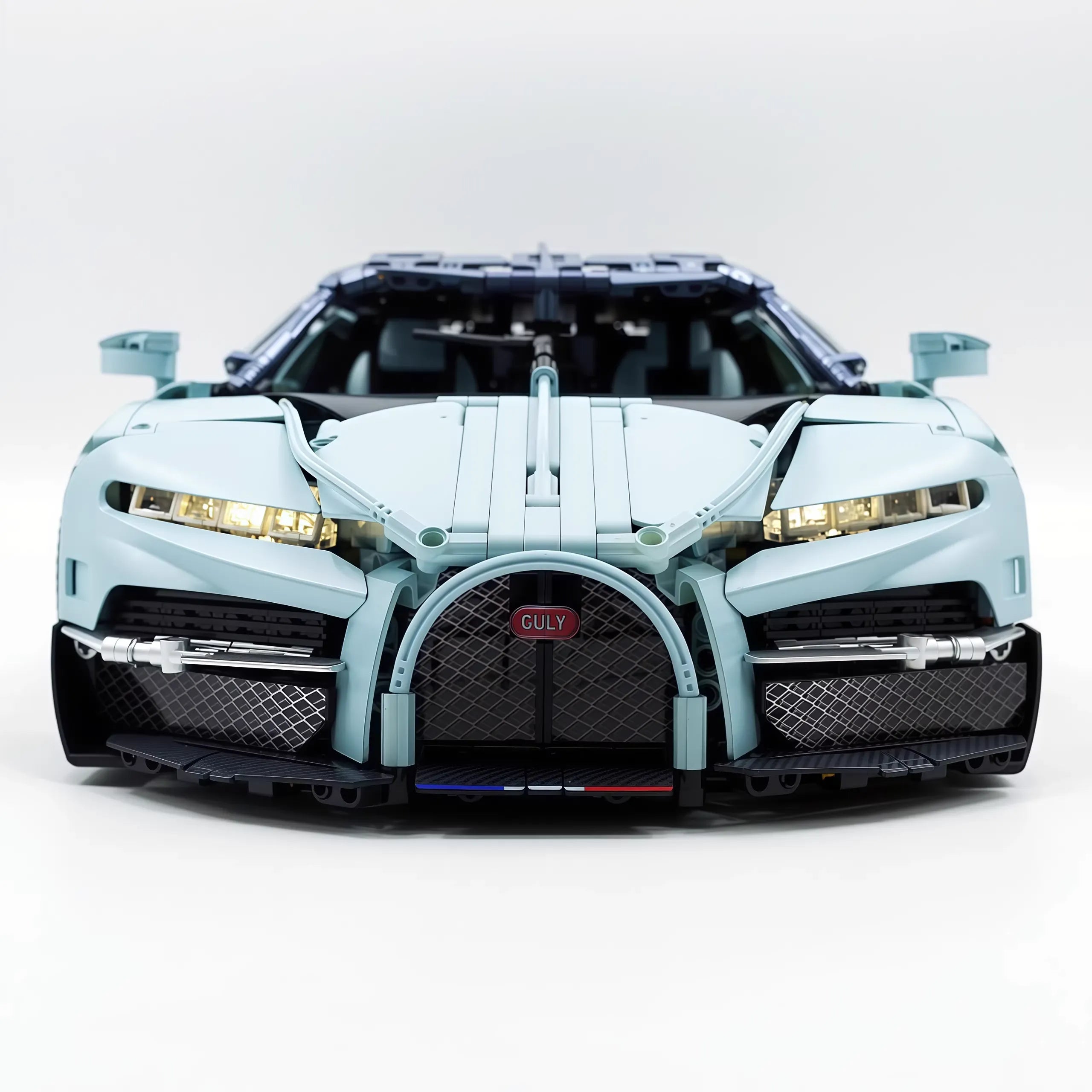 W16 Tourbillon hypercar building blocks kit front view — iconic horseshoe grille and LED headlights detail | Power Brickz